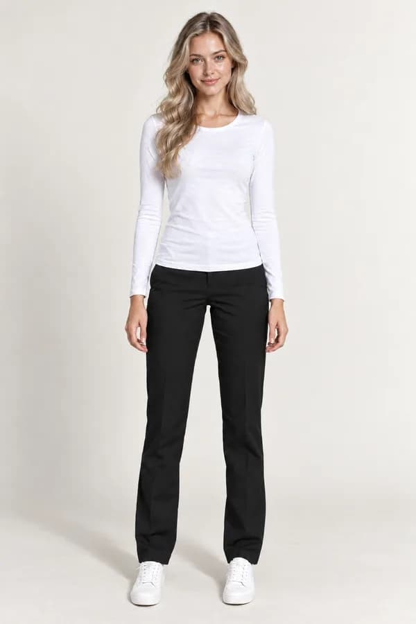 A full-body photo of a woman in a white top, black trousers and white sneakers