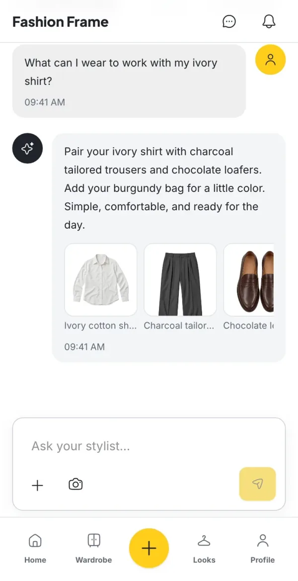 Fashion Frame stylist chat: asked what to wear to work with an ivory shirt, it suggests charcoal tailored trousers, chocolate loafers and a burgundy bag from the wardrobe